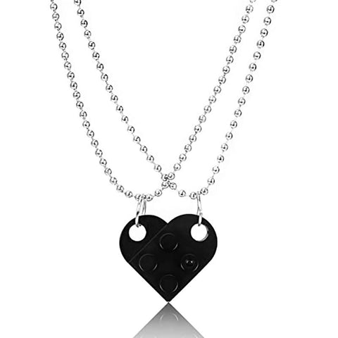 Black heart-shaped acrylic necklace with a silver chain, offering a bold and modern Valentine's Day gift.